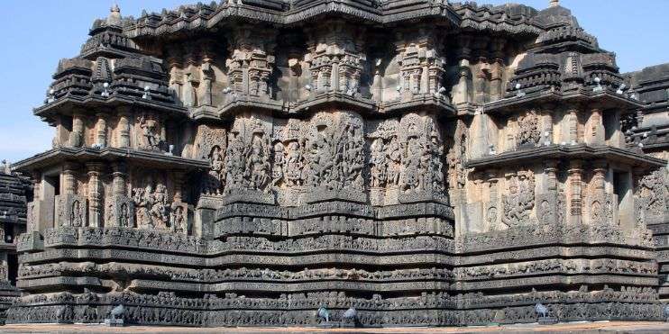 Stone temple with intricate carvings, showcasing exquisite craftsmanship and rich cultural heritage.