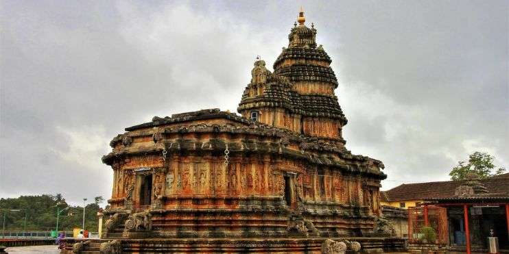 Stone temple with tower, ancient architecture, symbol of strength and spirituality.