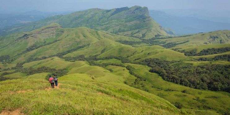 A scenic view of Kerala's best travel destinations, highlighting trekking adventures in Chikmagalur's Western Ghats.