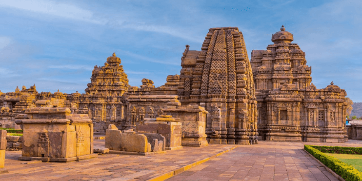 Ancient temples of Hampi, India, showcasing intricate carvings and rich architectural heritage of Karnataka's spirituality.