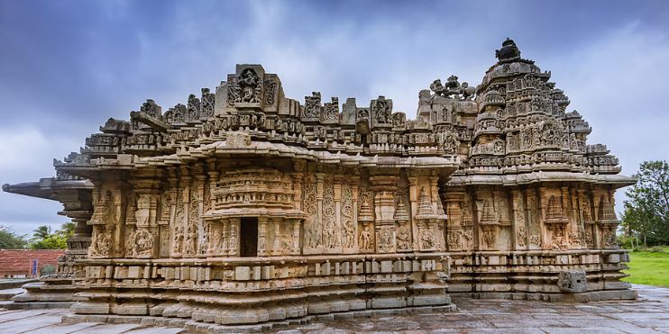 Stone temple adorned with intricate carvings, showcasing the exquisite Hoysala architecture of Karnataka's cultural heritage.