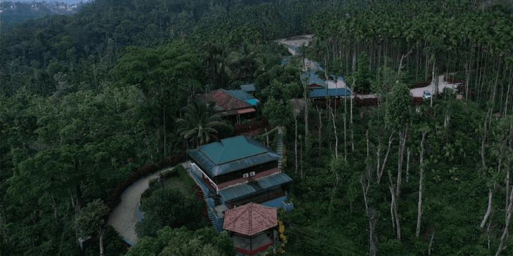 Aerial view of Bynekaadu resort, showcasing its serene surroundings and nature-centric design near Sakleshpur, Karnataka.