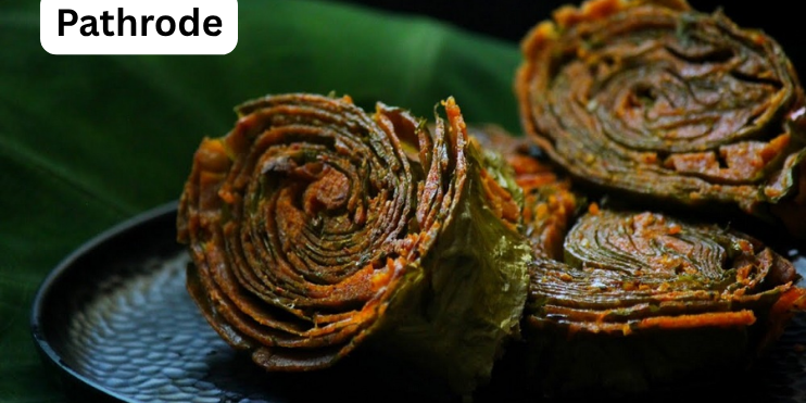 Pathrode recipe: rice paste and spices on colocasia leaves, rolled, steamed, and sliced into pinwheels, a Malnad delicacy.